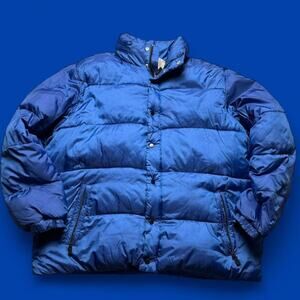 Blue puffer jacket with a